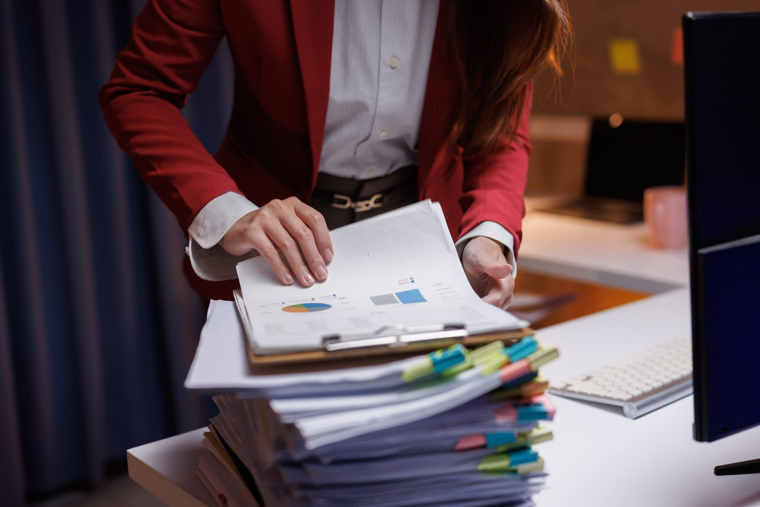 estate papers being organized and sorted on a desk